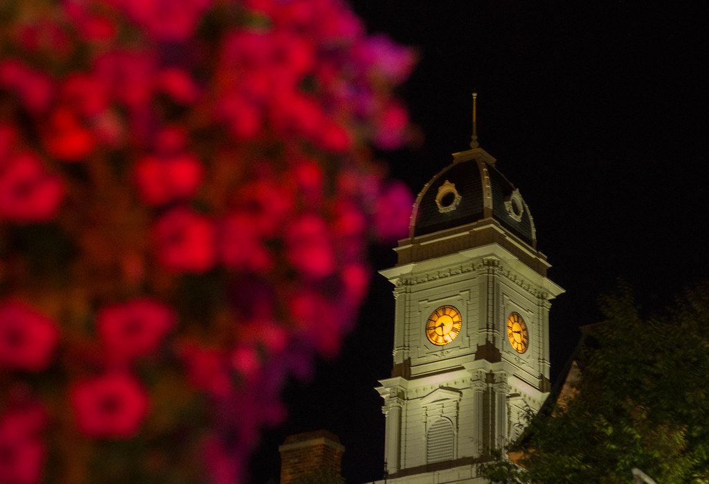Hamilton County Courthouse clock tower illuminated at night in Noblesville, Indiana